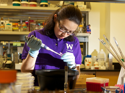 Student in a chemistry lab Image of a student in a chemistry lab