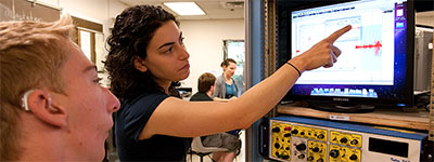ReportGRoupDiscuss1.jpg Person presenting on computer
