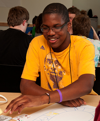 A student does an experiment during summer study.