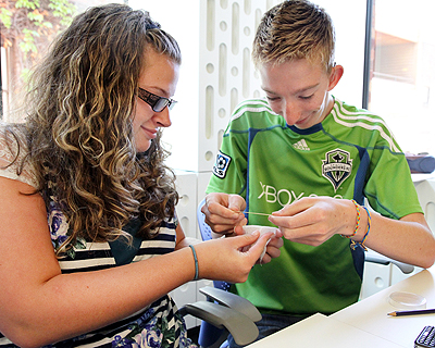 Students conducting a science experiment Image of students conducting a science experiment