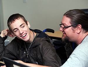 Student Services Conference Room Image of a faculty member consulting a student