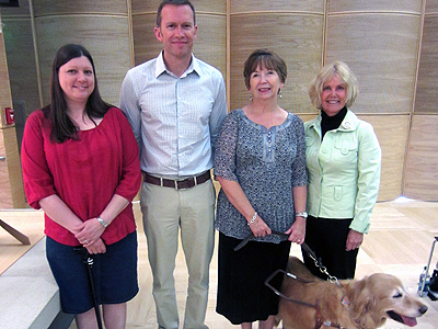 Photo of DO-IT Director Sheryl Burgstahler with DO-IT 2013 Trailblazers Anna Golden, Michael Richardson, and Susan Gjolmesli during the Trailblazers ceremony.