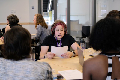 A student giving an oral presentation. A student giving an oral presentation.