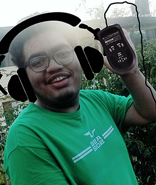 Image Warren created of himself with headphones and a mouse during web design. Image Warren created of himself with headphones and a mouse during web design.