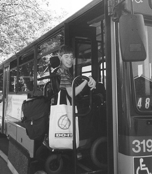 Photo of DO-IT Scholar Nick getting on a Metro bus.