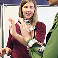 Image of an instructor demonstrating engineering prosthetics
