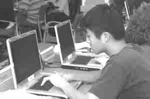 Photo of student using a laptop