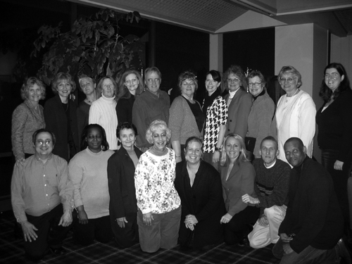 AccessCollege Team members in two rows pose for photo.