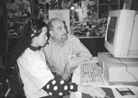 Photo of Priscilla and instructor in the computer lab