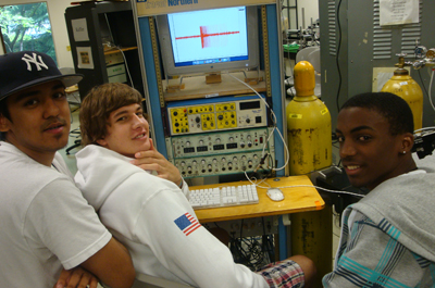 Group photo of DO-IT staff and students working on scientific computing technology