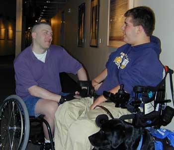 Microsoft developer John Wiederhirn (left) talks to Lukas Bratcher, a 16-year-old from Spokane, Wash., who visited the Redmond campus as part of his participation in the Disabilities, Opportunities, Internetworking, and Technology (DO-IT) Scholars program