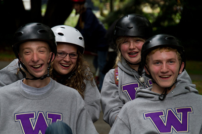 DO-IT Scholars riding adapted bikes. Group photo of DO-IT Scholars riding adapted bikes.