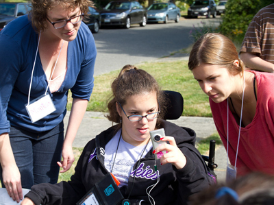 Photo group of DO-IT Scholar Macy filming at the Reel Grrls class.