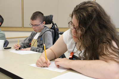 DO-IScholars working on a Summer Study classroom assignment. Photo of DO-IT Scholars working on a Summer Study classroom assignment.