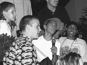 Image of DO-IT Scholars having fun participating in Karaoke.