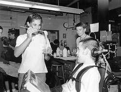 Photo of Krhystal shows Justin the goo project in the science lab