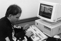 Photo of man at computer