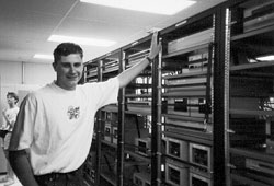 Photo of Jeremy in the main machine room