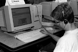 DO-IT Scholar Keaton browsing the Web Photo of DO-IT Scholar Keaton browsing the Web