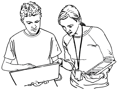 An instructor works with a student on a computer. An instructor works with a student on a computer.