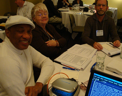 Photo of Donald Parks, Pat Butin, and Michael Harris at a table