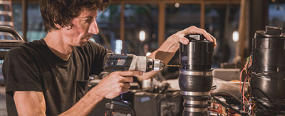 Man drilling a PVC piece