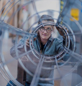 Amie working on a wire sculpture