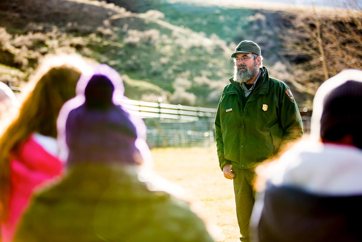 Rick Wallen, the lead biologist for bison in Yellowstone, talks to students about his work.
