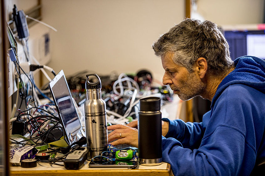Professor Daniel Grünbaum assembles infrared cameras to film zooplankton in dark waters.